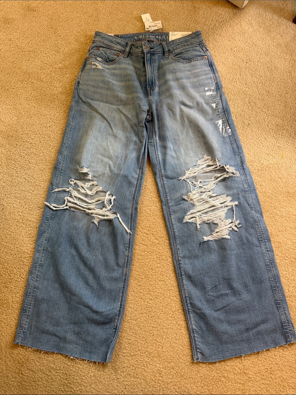 Dreamy Drape Low-Rise Baggy Wide-Leg Jeans in Light Blue by American Eagle